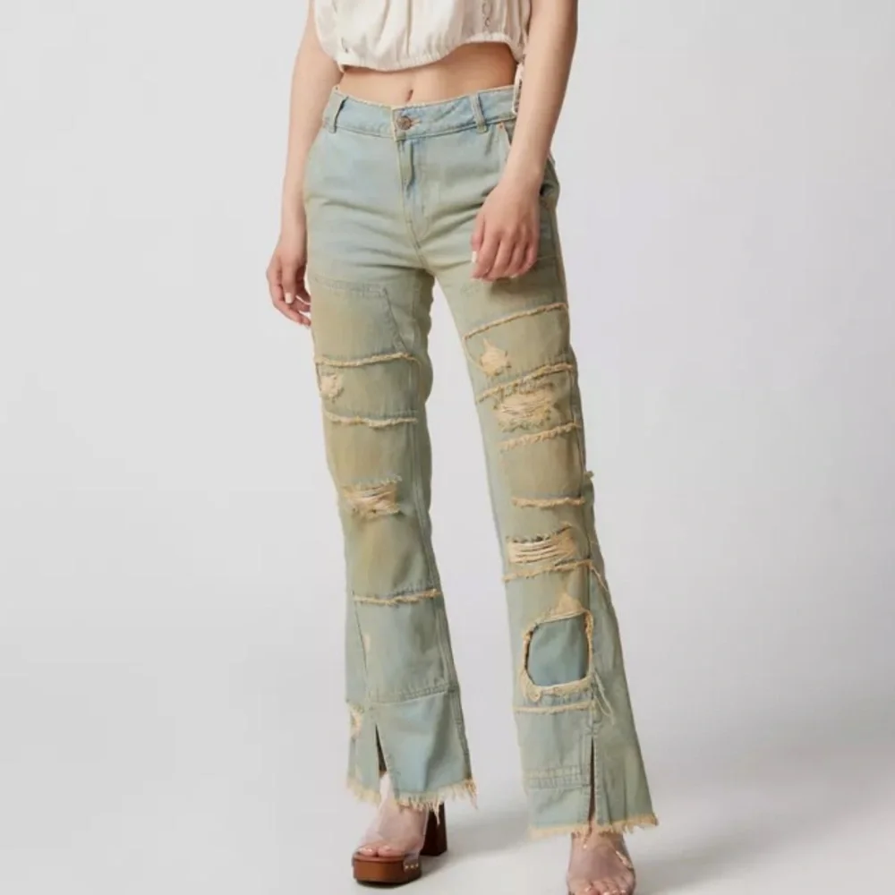 Urban Outfitters BDG Extreme Destroyed Bootcut Jean Mid Rise Rigid Denim Jeans
